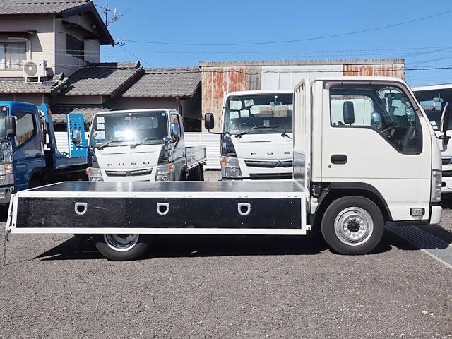 平ボディ　積載１．５ｔ　標準１０尺フラットロー　荷台床鉄板張　積載１５５０Ｋｇ　１０尺　フラットロー　誤発進抑制機能　プリクラッシュ　ＬＤＷＳ　ＥＳＣ　ＬＥＤライト　ナビ　ＴＶ　ＥＴＣ　キーレス　モケットシート　スペアキー　Ｗエアバック　あおりロープ穴３対(10枚目)