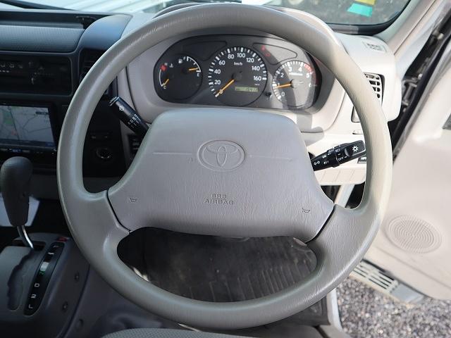 ダイナトラック 平ボディ　リフト　幌付き　積載１３５０ｋｇ　ＴＥＣＳ　標準　幌カーテン　トヨタ車体　垂直パワーゲート　標準１０尺　フルジャストロー　ナビ　ＴＶ　バックカメラ　ＥＴＣ　フォグランプ　左電格ミラー　車両総重量３７８５ＬＫｇ　リフト能力４００ＫＧゲート超１２０ｃｍ（4枚目）