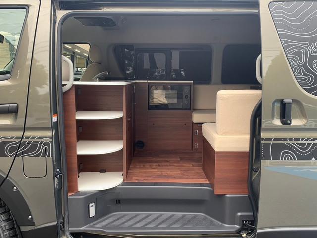 ハイエースワゴン VANLIFEオリジナル ベガ 新車 電動ドア 全周囲カメラ アルパインナビ 電子レンジ 冷蔵庫 丸目ヘッドライト ヴァレンティテール ジャオスマッドガード 後席モニター 衝突軽減ブレーキ スマートキー プッシュスタート 走行充電(43枚目)
