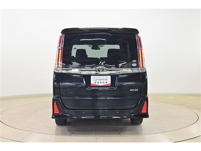 ノア Ｓｉ　ダブルバイビーＩＩ　横滑防止装置　ＰＣＳ　スマートキ－　Ｗエアコン　Ｂモニター　ＤＶＤ再生可　フルセグテレビ　ＥＴＣ付き　オートエアコン　ＰＳ　ナビ＆ＴＶ　ＰＷ　ＬＥＤヘッド　盗難防止システム　ＡＢＳ　３列シート（3枚目）