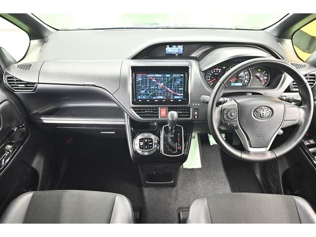 ノア Ｓｉ　ダブルバイビーＩＩ　横滑防止装置　ＰＣＳ　スマートキ－　Ｗエアコン　Ｂモニター　ＤＶＤ再生可　フルセグテレビ　ＥＴＣ付き　オートエアコン　ＰＳ　ナビ＆ＴＶ　ＰＷ　ＬＥＤヘッド　盗難防止システム　ＡＢＳ　３列シート（6枚目）