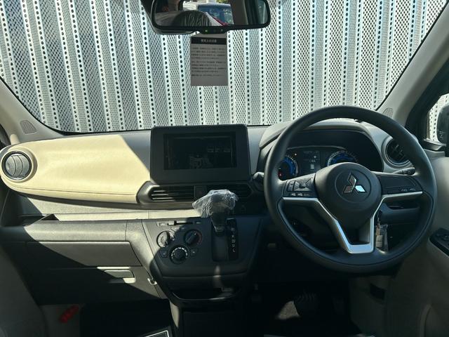 ｅＫワゴン Ｍ　届出済未使用車　衝突被害軽減ブレーキ　コーナーセンサー　キーレスエントリー　シートヒーター　バックカメラ　アイドリングストップ　電動格納ドアミラー　ベンチシート　マニュアルエアコン　パワーウインドウ（12枚目）