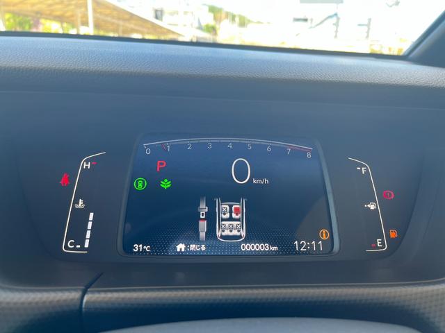 フィット ベーシック　登録済未使用車　衝突被害軽減ブレーキ　コーナーセンサー　スマートキー　アダクティブクルーズコントロール　電動格納ドアミラー　横滑り防止機能　オートハイビーム　オートエアコン　パワーウインドウ（13枚目）