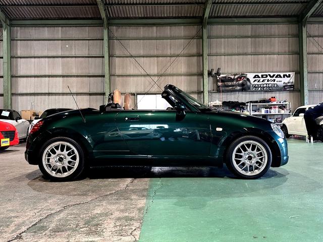 コペン タンレザーエディション　４ＡＴ　ＥＴＣ　社外１５インチアルミ　社外ＬＥＤヘッドライト＆ＬＥＤフォグライト　社外前後ストラットタワーバー　純正タンカラー内装　シートヒーター　純正ウッド内装　専門店整備済み　室内展示車両（34枚目）