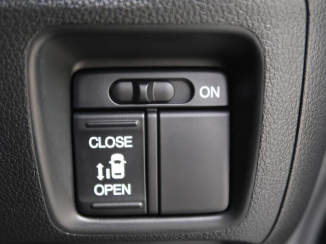 G・Lパッケージ 電動スライドドア 禁煙車 SDナビ ETC バックカメラ スマートキー オートエアコン ステアリングスイッチ プライバシーガラス 盗難防止装置 ベンチシート 電動格納ミラー 横滑り防止システム(8枚目)