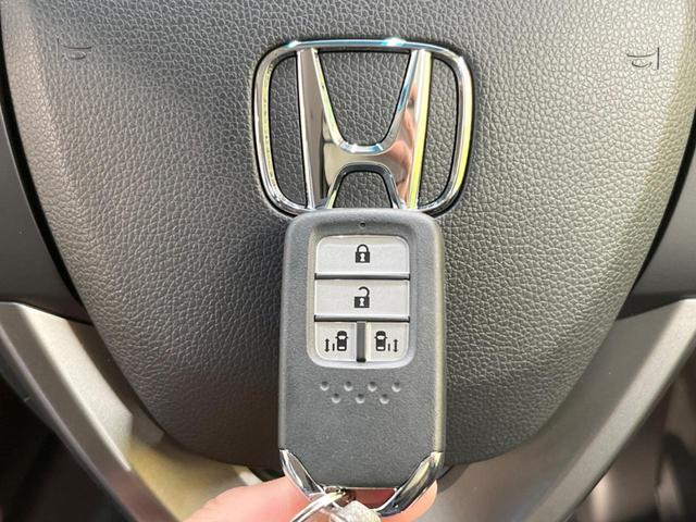 G 両側電動スライドドア ホンダセンシング 登録済み未使用車 アダプティブクルーズ バックカメラ シートヒーター レーンアシスト 踏み間違い防止 スマートキー ロールサンシェード ステアリングスイッチ(7枚目)