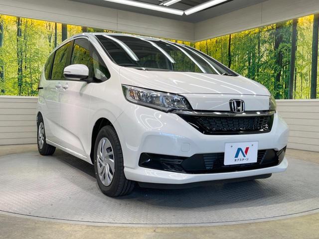 G 両側電動スライドドア ホンダセンシング 登録済み未使用車 アダプティブクルーズ バックカメラ シートヒーター レーンアシスト 踏み間違い防止 スマートキー ロールサンシェード ステアリングスイッチ(18枚目)