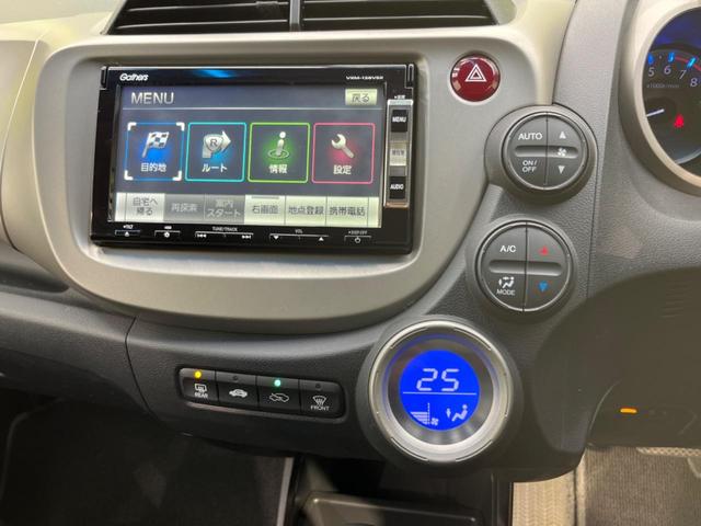 ハイブリッド・10thアニバーサリー 禁煙車 純正SDナビ バックカメラ ETC クルーズコントロール スマートキー 革巻きステアリング DVD再生 盗難防止装置 プライバシーガラス ベンチシート バニティミラー(37枚目)