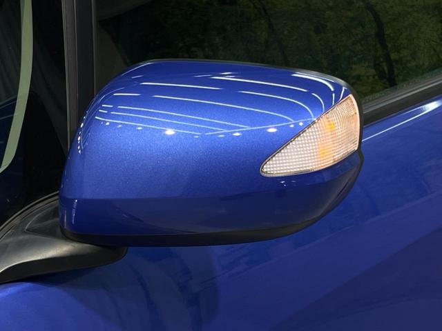 ハイブリッド・10thアニバーサリー 禁煙車 純正SDナビ バックカメラ ETC クルーズコントロール スマートキー 革巻きステアリング DVD再生 盗難防止装置 プライバシーガラス ベンチシート バニティミラー(63枚目)