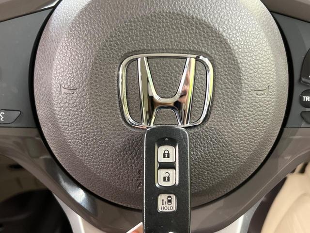 G・Lホンダセンシング ホンダセンシング ETC 純正ディスプレイオーディオ バックカメラ 電動スライドドア Bluetooth LEDヘッドライト スマートキー 踏み間違い防止 レーンキープ ステアリングスイッチ(24枚目)