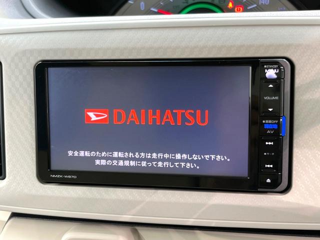 ムーヴキャンバス Ｌ　禁煙車　純正フルセグナビ　Ｂｌｕｅｔｏｏｔｈ再生　ＥＴＣ　ＣＤ　ＤＶＤ　アイドリングストップ　電動格納ミラー　キーレス　横滑り防止装置　バニティミラー（3枚目）