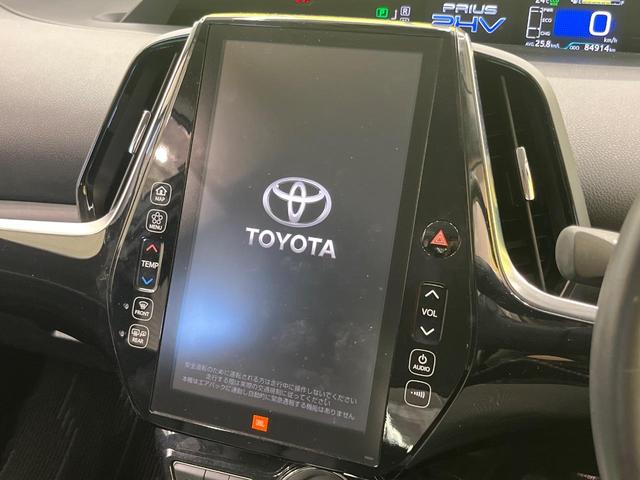 プリウスＰＨＶ Ａプレミアム　禁煙車　モデリスタ　１１．６型ナビ　衝突軽減　レーダークルーズ　ＢＳＭ　ＨＵＤ　パーキングアシスト　合皮レザー　パワーシート　シートヒーター　クリアランスソナー　モデリスタ１８インチＡＷ　ＡＣ１００Ｖ（3枚目）
