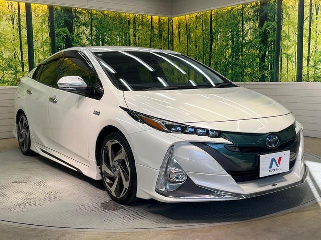 プリウスＰＨＶ Ａプレミアム　禁煙車　モデリスタ　１１．６型ナビ　衝突軽減　レーダークルーズ　ＢＳＭ　ＨＵＤ　パーキングアシスト　合皮レザー　パワーシート　シートヒーター　クリアランスソナー　モデリスタ１８インチＡＷ　ＡＣ１００Ｖ（16枚目）