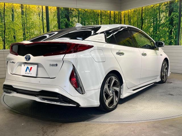 プリウスＰＨＶ Ａプレミアム　禁煙車　モデリスタ　１１．６型ナビ　衝突軽減　レーダークルーズ　ＢＳＭ　ＨＵＤ　パーキングアシスト　合皮レザー　パワーシート　シートヒーター　クリアランスソナー　モデリスタ１８インチＡＷ　ＡＣ１００Ｖ（17枚目）