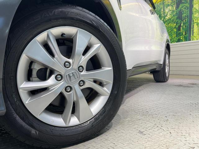 ヴェゼル ハイブリッドX・ホンダセンシング 純正ナビ バックカメラ ホンダセンシング レーダークルーズ 禁煙車 スマートキー LEDヘッド ETC 車線逸脱警報 誤発進抑制機能 オートライト デュアルオートエアコン Bluetooth(13枚目)