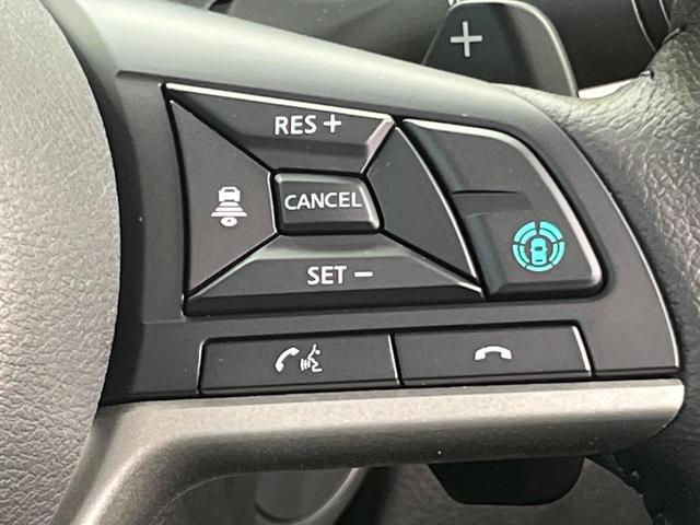 デリカミニ T プレミアム 届出済未使用車 両側電動ドア 全周囲カメラ e-Assist レーダークルーズ 禁煙車 ハーフレザーシート シートヒーター コーナーセンサー スマートキー LEDヘッド ETC 車線逸脱警報(6枚目)