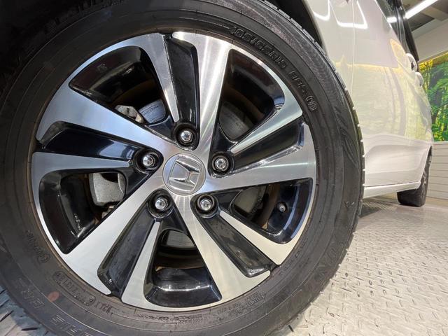 フリードハイブリッド ハイブリッド・EX 両側電動スライド 純正9型ナビ フリップダウン バックカメラ ホンダセンシング レーダークルーズ 禁煙車 ハーフレザーシート シートヒーター レーンキープ スマートキー LEDヘッド ETC(14枚目)