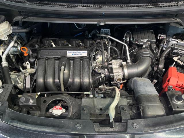 フリードハイブリッド ハイブリッド・EX 両側電動スライド 純正9型ナビ フリップダウン バックカメラ ホンダセンシング レーダークルーズ 禁煙車 ハーフレザーシート シートヒーター レーンキープ スマートキー LEDヘッド ETC(18枚目)