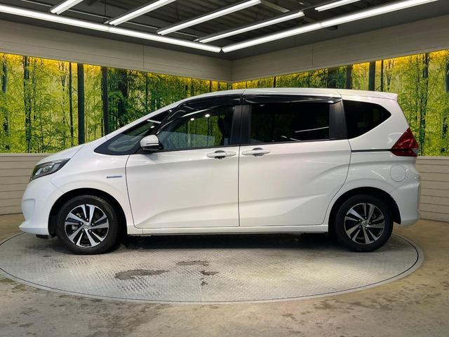 フリードハイブリッド ハイブリッド・EX 両側電動スライド 純正9型ナビ フリップダウン バックカメラ ホンダセンシング レーダークルーズ 禁煙車 ハーフレザーシート シートヒーター レーンキープ スマートキー LEDヘッド ETC(25枚目)