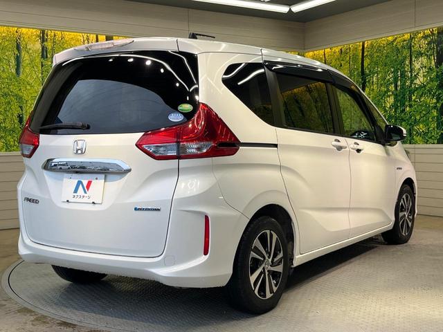 フリードハイブリッド ハイブリッド・EX 両側電動スライド 純正9型ナビ フリップダウン バックカメラ ホンダセンシング レーダークルーズ 禁煙車 ハーフレザーシート シートヒーター レーンキープ スマートキー LEDヘッド ETC(28枚目)