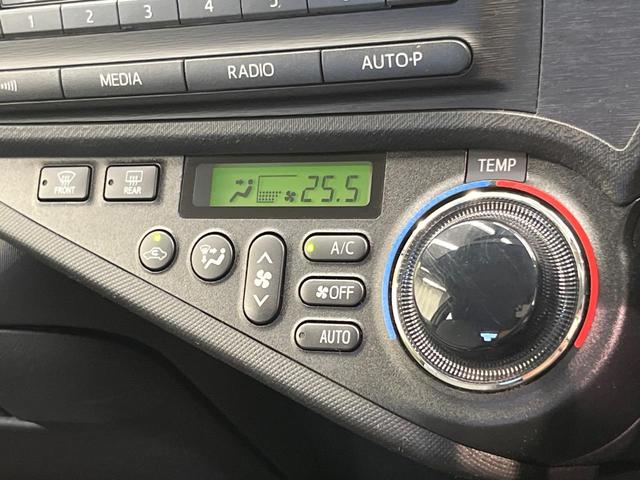 アクア G 禁煙車 スマートキー オートライト オートエアコン CD 電動格納ミラー 盗難防止装置 バニティミラー AUX ドアバイザー プライバシーガラス(5枚目)