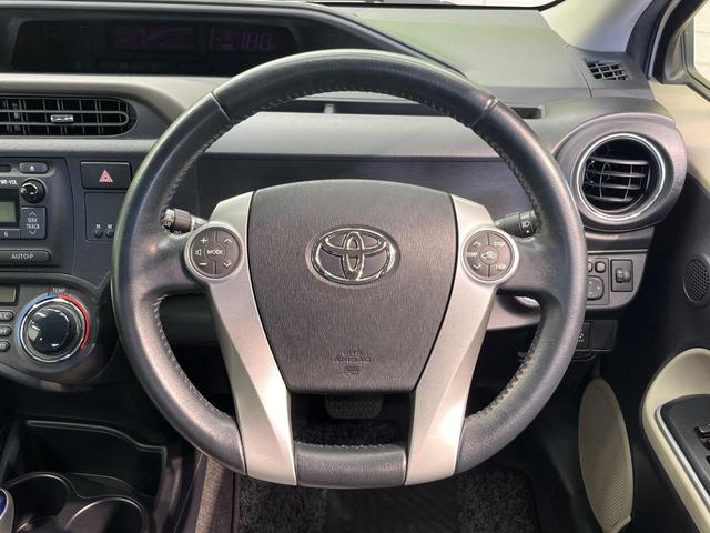 アクア G 禁煙車 スマートキー オートライト オートエアコン CD 電動格納ミラー 盗難防止装置 バニティミラー AUX ドアバイザー プライバシーガラス(11枚目)