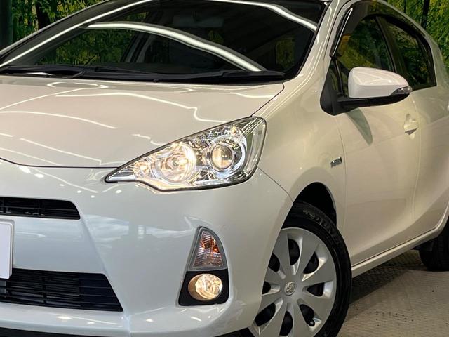 アクア G 禁煙車 スマートキー オートライト オートエアコン CD 電動格納ミラー 盗難防止装置 バニティミラー AUX ドアバイザー プライバシーガラス(12枚目)