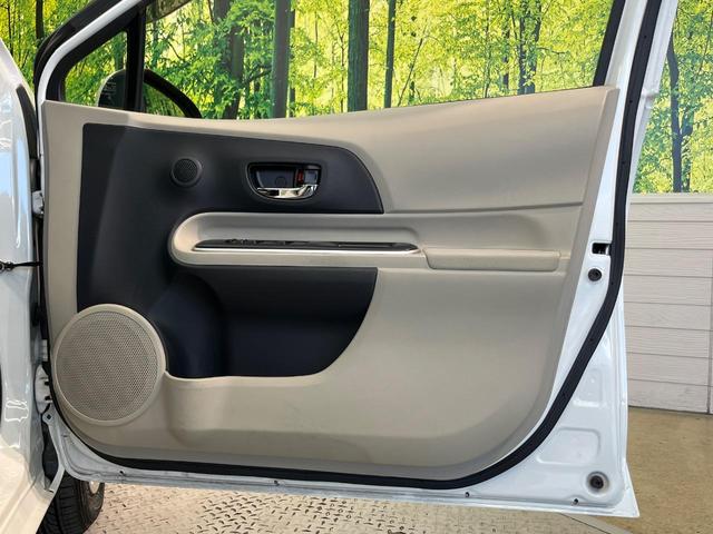 アクア G 禁煙車 スマートキー オートライト オートエアコン CD 電動格納ミラー 盗難防止装置 バニティミラー AUX ドアバイザー プライバシーガラス(51枚目)