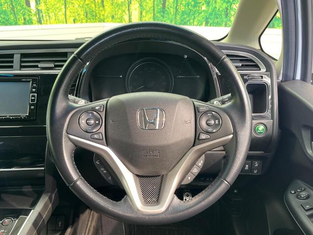 シャトル ハイブリッドX ホンダセンシング 純正ナビ バックカメラ ホンダセンシング レーダークルーズ 禁煙車 ハーフレザーシート シートヒーター スマートキー LEDヘッド ETC 車線逸脱警報 誤発進抑制機能 先行車発進お知らせ機能(11枚目)