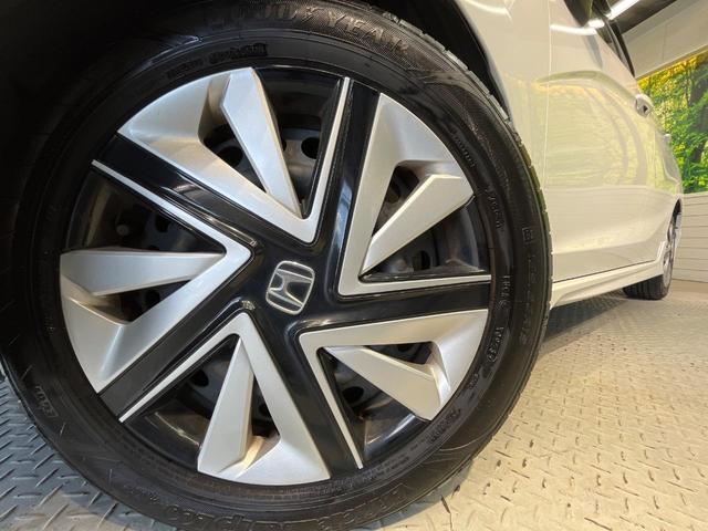 シャトル ハイブリッドX ホンダセンシング 純正ナビ バックカメラ ホンダセンシング レーダークルーズ 禁煙車 ハーフレザーシート シートヒーター スマートキー LEDヘッド ETC 車線逸脱警報 誤発進抑制機能 先行車発進お知らせ機能(13枚目)