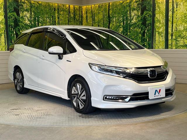 シャトル ハイブリッドX ホンダセンシング 純正ナビ バックカメラ ホンダセンシング レーダークルーズ 禁煙車 ハーフレザーシート シートヒーター スマートキー LEDヘッド ETC 車線逸脱警報 誤発進抑制機能 先行車発進お知らせ機能(16枚目)