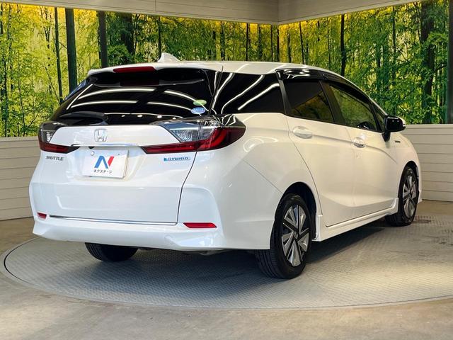 シャトル ハイブリッドX ホンダセンシング 純正ナビ バックカメラ ホンダセンシング レーダークルーズ 禁煙車 ハーフレザーシート シートヒーター スマートキー LEDヘッド ETC 車線逸脱警報 誤発進抑制機能 先行車発進お知らせ機能(17枚目)