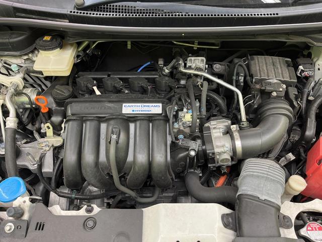 シャトル ハイブリッドX ホンダセンシング 純正ナビ バックカメラ ホンダセンシング レーダークルーズ 禁煙車 ハーフレザーシート シートヒーター スマートキー LEDヘッド ETC 車線逸脱警報 誤発進抑制機能 先行車発進お知らせ機能(18枚目)