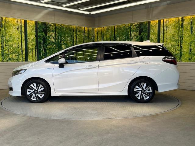 シャトル ハイブリッドX ホンダセンシング 純正ナビ バックカメラ ホンダセンシング レーダークルーズ 禁煙車 ハーフレザーシート シートヒーター スマートキー LEDヘッド ETC 車線逸脱警報 誤発進抑制機能 先行車発進お知らせ機能(25枚目)