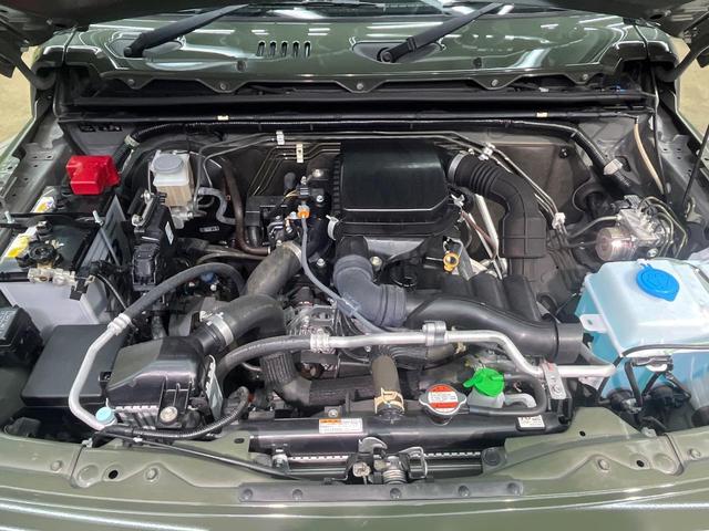 ジムニー ＸＧ　６ＭＴ　４ＷＤ　純正ＳＤナビ　衝突被害軽減システム　禁煙車　ＥＴＣ　オートハイビーム　車線逸脱警報　オートライト　純正１６インチアルミ　Ｂｌｕｅｔｏｏｔｈ　ＣＤ　ＤＶＤ再生　フルセグ（18枚目）