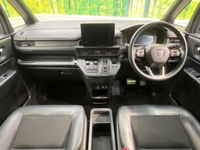 ステップワゴン ｅ：ＨＥＶスパーダ　両側電動スライド　純正９型ナビ　バックカメラ　ホンダセンシング　レーダークルーズ　禁煙車　パワーバックドア　ハーフレザーシート　コーナーセンサー　レーンキープ　スマートキー　ＬＥＤヘッド　ＥＴＣ（2枚目）
