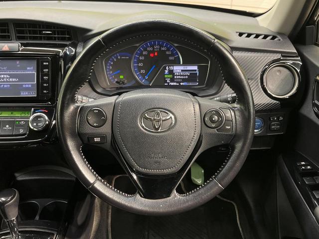 カローラフィールダー ハイブリッドＧ　エアロツアラー・ダブルバイビー　純正ナビ　バックカメラ　禁煙車　ハーフレザーシート　スマートキー　ＨＩＤヘッド　ＥＴＣ　１５インチＡＷ　オートライト　オートエアコン　Ｂｌｕｅｔｏｏｔｈ　ＣＤ再生　フルセグ　プライバシーガラス（11枚目）