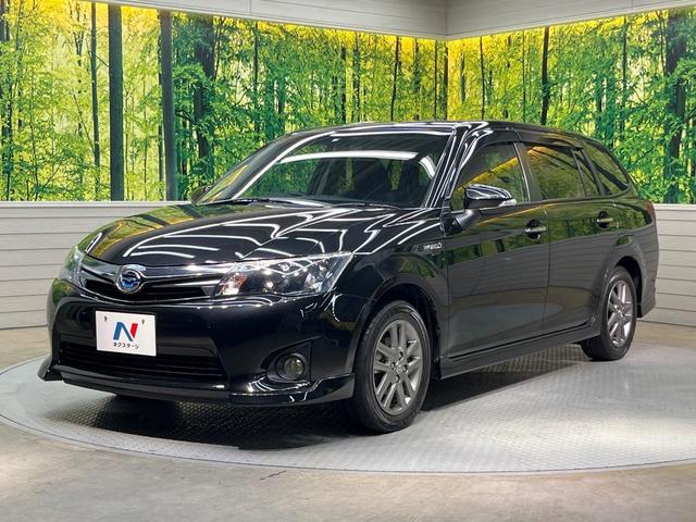 カローラフィールダー ハイブリッドＧ　エアロツアラー・ダブルバイビー　純正ナビ　バックカメラ　禁煙車　ハーフレザーシート　スマートキー　ＨＩＤヘッド　ＥＴＣ　１５インチＡＷ　オートライト　オートエアコン　Ｂｌｕｅｔｏｏｔｈ　ＣＤ再生　フルセグ　プライバシーガラス（24枚目）