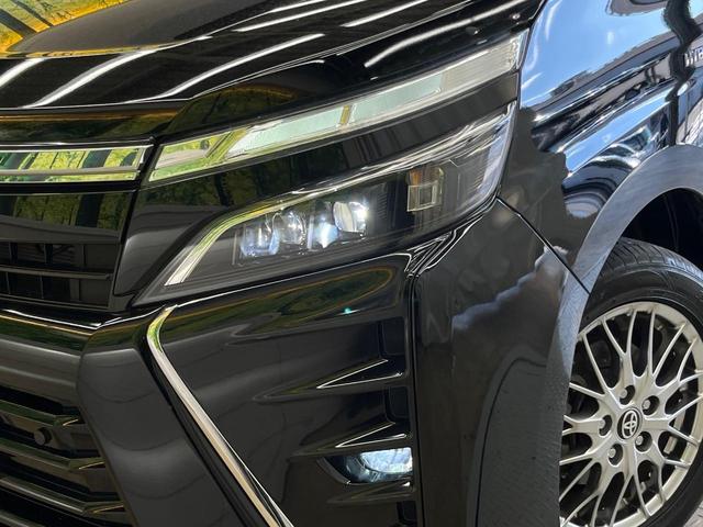 ヴォクシー ハイブリッドＺＳ　煌ＩＩ　両側電動ドア　後席モニター　バックカメラ　衝突被害軽減システム　禁煙車　ドラレコ　コーナーセンサー　スマートキー　ＬＥＤヘッド　ビルトインＥＴＣ　クルコン　純正１６インチアルミ　オートハイビーム（13枚目）