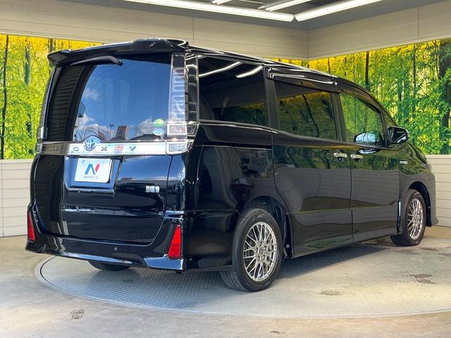 ヴォクシー ハイブリッドＺＳ　煌ＩＩ　両側電動ドア　後席モニター　バックカメラ　衝突被害軽減システム　禁煙車　ドラレコ　コーナーセンサー　スマートキー　ＬＥＤヘッド　ビルトインＥＴＣ　クルコン　純正１６インチアルミ　オートハイビーム（27枚目）