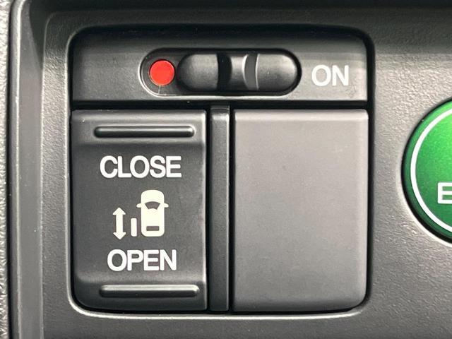 オデッセイ アブソルート 電動スライドドア SDナビ 後席モニター 衝突被害軽減システム 禁煙車 ハーフレザーシート スマートキー LEDヘッド ビルトインETC クルコン 純正17インチアルミ オートライト オートエアコン(6枚目)