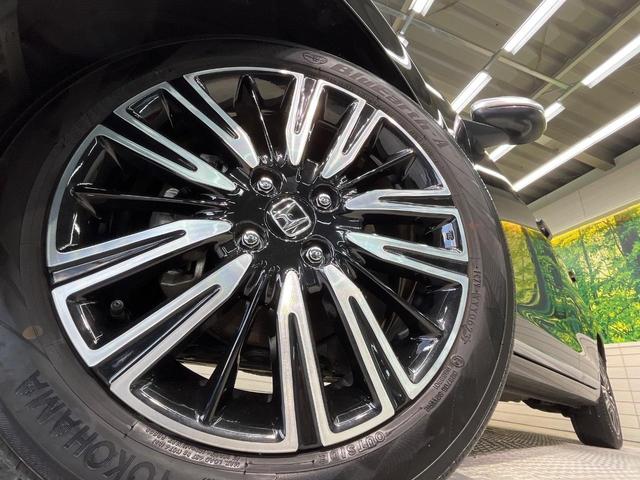 フィット ｅ：ＨＥＶリュクス　純正９型ナビ　全周囲カメラ　衝突被害軽減システム　レーダークルーズ　禁煙車　ハーフレザーシート　コーナーセンサー　スマートキー　ＬＥＤヘッド　ビルトインＥＴＣ　純正１６インチアルミ　オートハイビーム（13枚目）