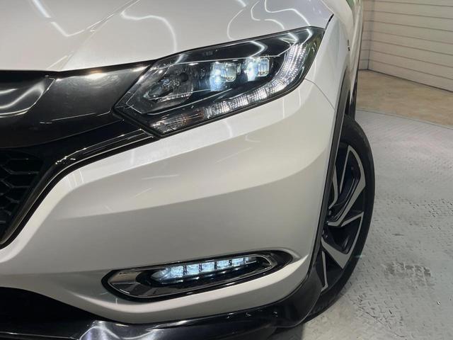 ヴェゼル ハイブリッドRS・ホンダセンシング 純正SDナビ バックカメラ 衝突被害軽減システム 禁煙車 ハーフレザーシート スマートキー LEDヘッド ビルトインETC 純正18インチアルミ 車線逸脱警報 オートライト デュアルエアコン(12枚目)