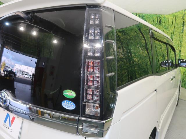 ハイブリッドZS 煌II 禁煙車 純正10インチナビ Bluetooth接続 衝突軽減 バックカメラ フリップダウンモニター 両側電動スライド ETC LEDヘッドライト デュアルオートエアコン オートライト 7人乗り 禁煙車(65枚目)