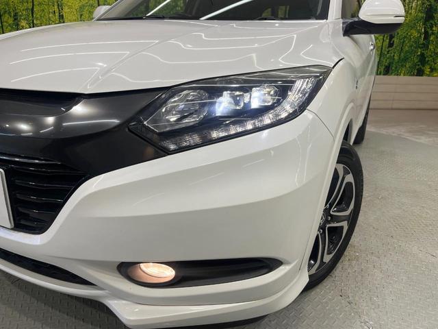 ヴェゼル ハイブリッドＺ　純正ナビ　衝突軽減装置　クルーズコントロール　ＬＥＤヘッドライト　ＥＴＣ　バックカメラ　Ｂｌｕｅｔｏｏｔｈ　オートエアコン　スマートキー　プッシュスタート　シートリフター　電動格納ドアミラー（12枚目）
