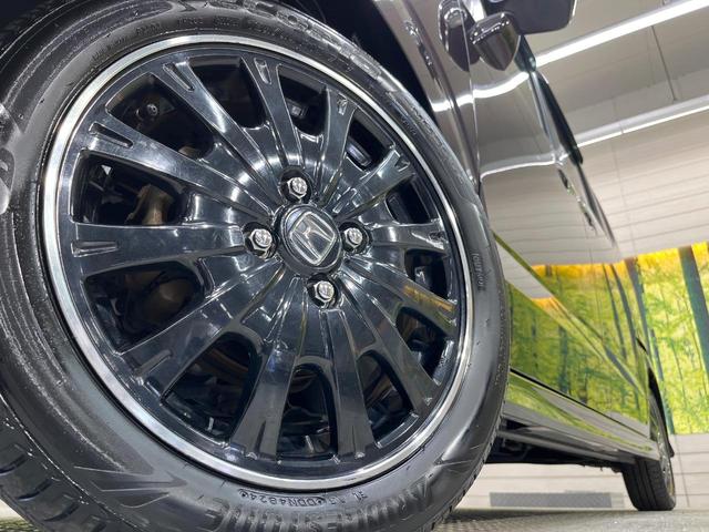 N-BOXカスタム G ターボSSブラックスタイルパッケージ ターボ SDナビ 両側電動スライド クルコン 衝突軽減装置 禁煙車 合皮シート ドラレコ スマートキー HIDヘッド シートヒーター ETC オートライト オートエアコン 純正15インチアルミ(12枚目)