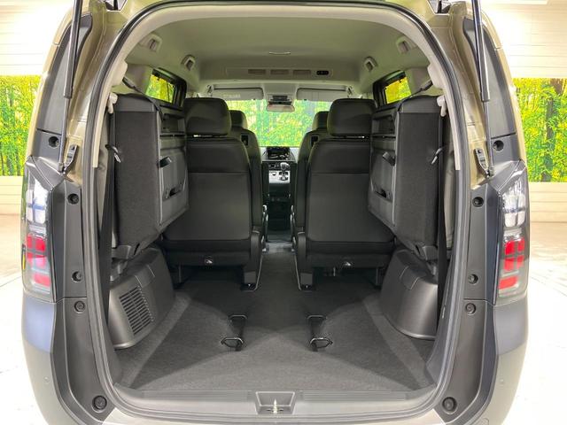 フリード クロスター 登録済未使用車 両側電動ドア 衝突被害軽減システム レーダークルーズ 禁煙車 コーナーセンサー スマートキー LEDヘッド オートハイビーム オートライト オートエアコン 純正15インチアルミ(11枚目)