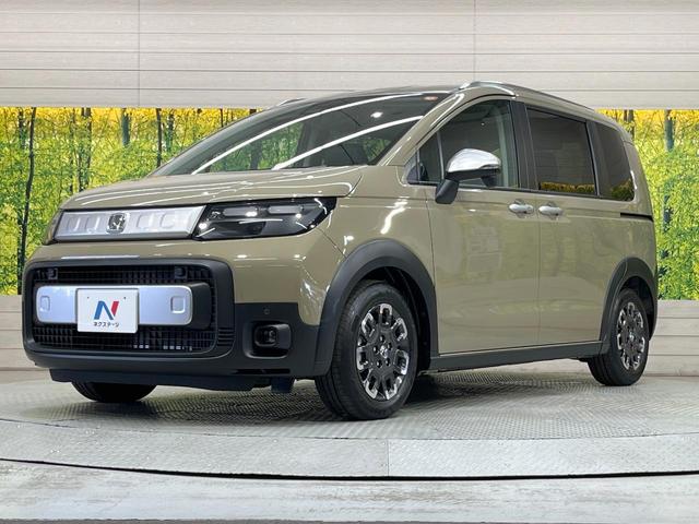 フリード クロスター 登録済未使用車 両側電動ドア 衝突被害軽減システム レーダークルーズ 禁煙車 コーナーセンサー スマートキー LEDヘッド オートハイビーム オートライト オートエアコン 純正15インチアルミ(17枚目)