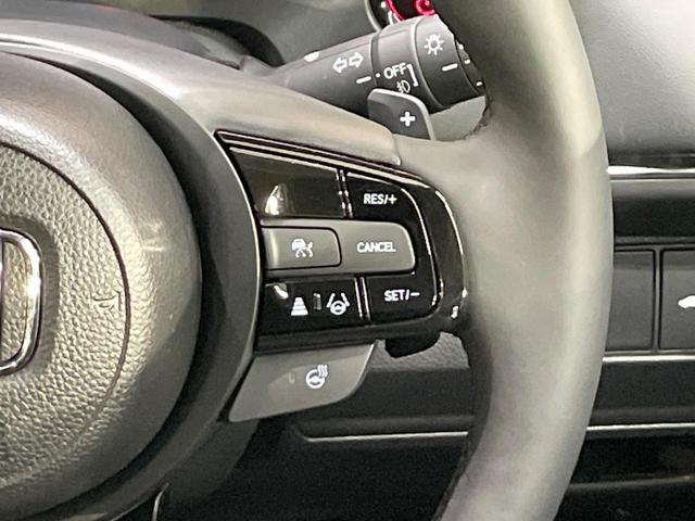 ヴェゼル e:HEV Z 純正9型ナビ 全周囲カメラ ブラインドスポットモニター レーダークルーズ ETC Bluetooth フルセグTV 衝突軽減装置 LEDヘッド 置くだけ充電 パドルシフト 電動リアゲート(7枚目)