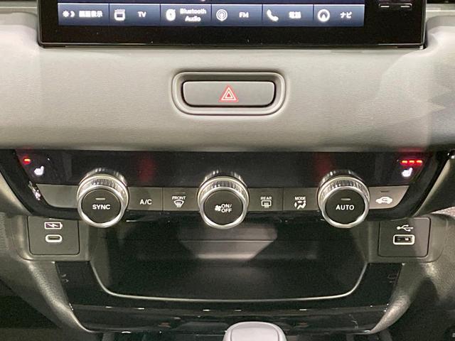 ヴェゼル e:HEV Z 純正9型ナビ 全周囲カメラ ブラインドスポットモニター レーダークルーズ ETC Bluetooth フルセグTV 衝突軽減装置 LEDヘッド 置くだけ充電 パドルシフト 電動リアゲート(43枚目)